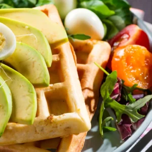 Savory Belgian Waffle with Avocado, Eggs, Microgreens & Tomatoes